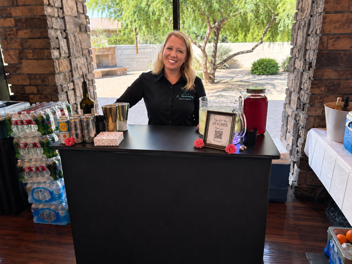 A Plus Bartending portable bar setup at an event